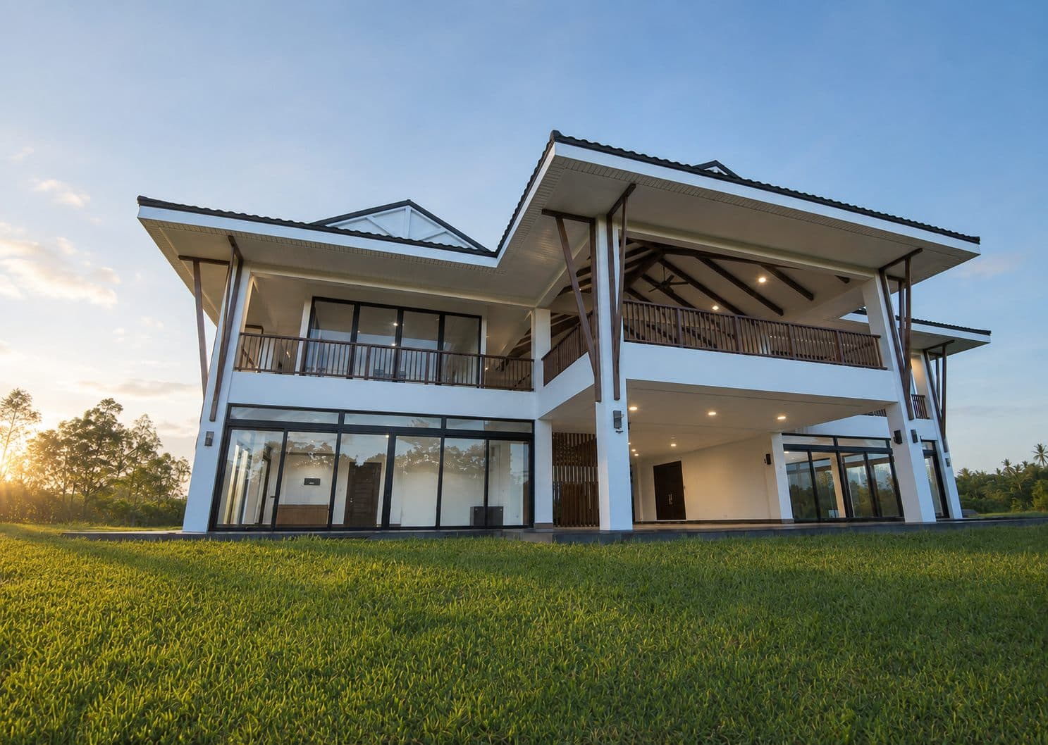 Modern two-storey Plantation Villas home at dusk